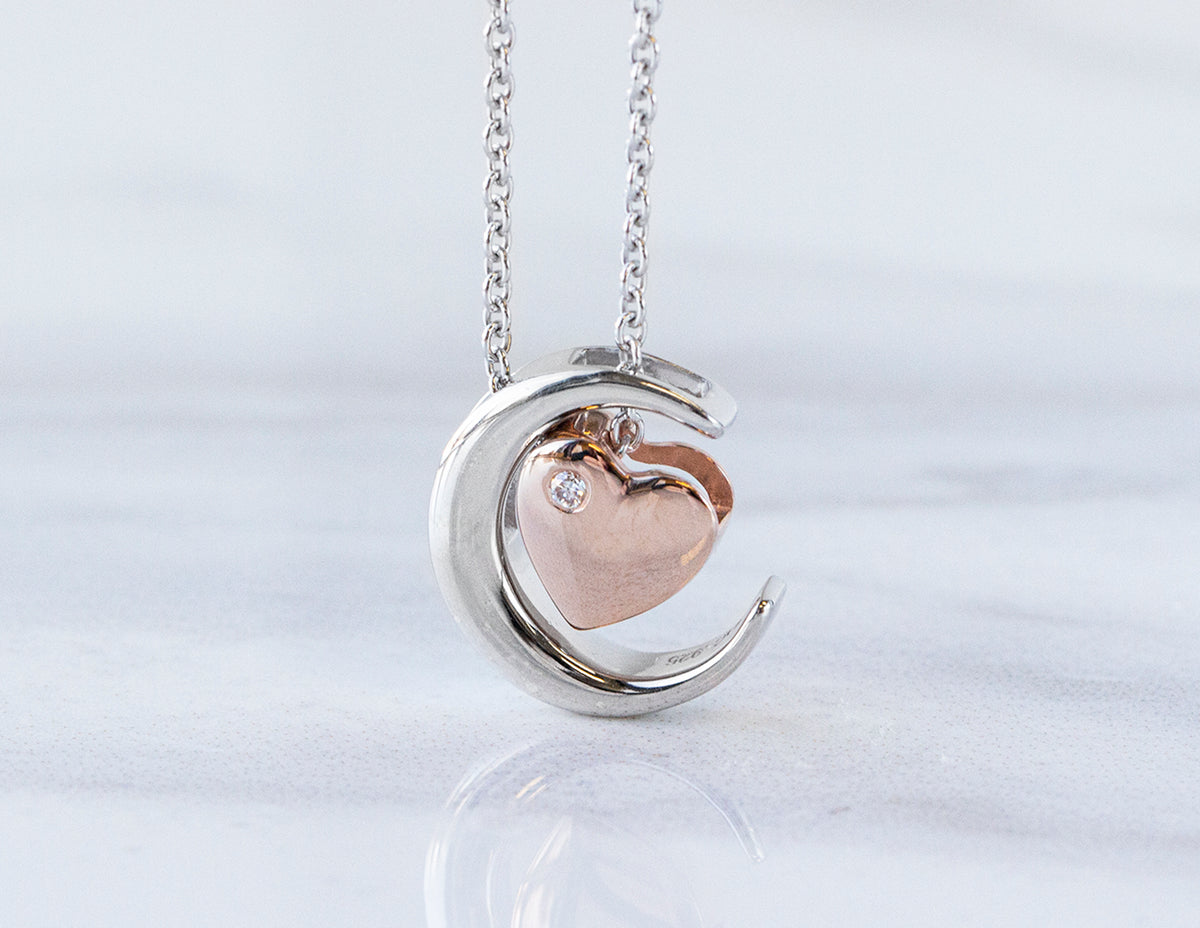 .01ct. t.w. Diamond 'Love U to the moon & back' Pendant in Sterling Silver & 10K Rose Gold