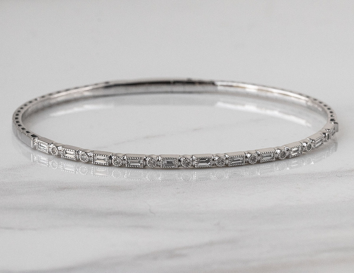 2/5ct. t.w. Round and Baguette Cut Diamond Bangle Bracelet in 14K White Gold