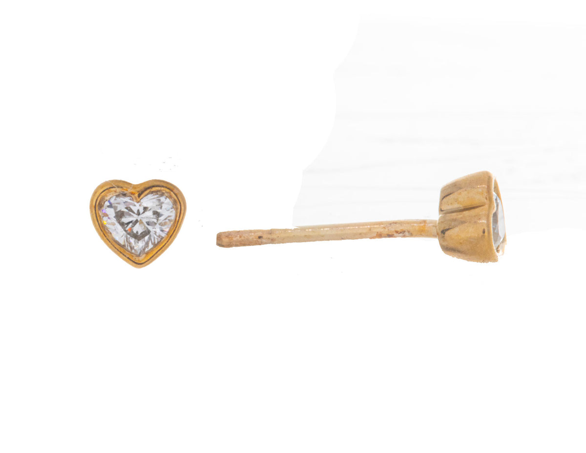 1/5ct. t.w. Heart Shape Diamond Stud Earrings in 10K Yellow Gold