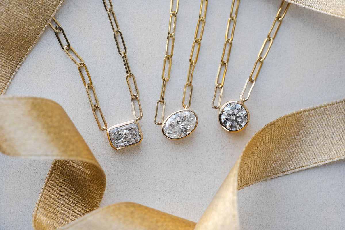 1 1/2ct. Radiant Cut Newborn Lab Created Diamond Bezel Pendant in 14K Yellow Gold