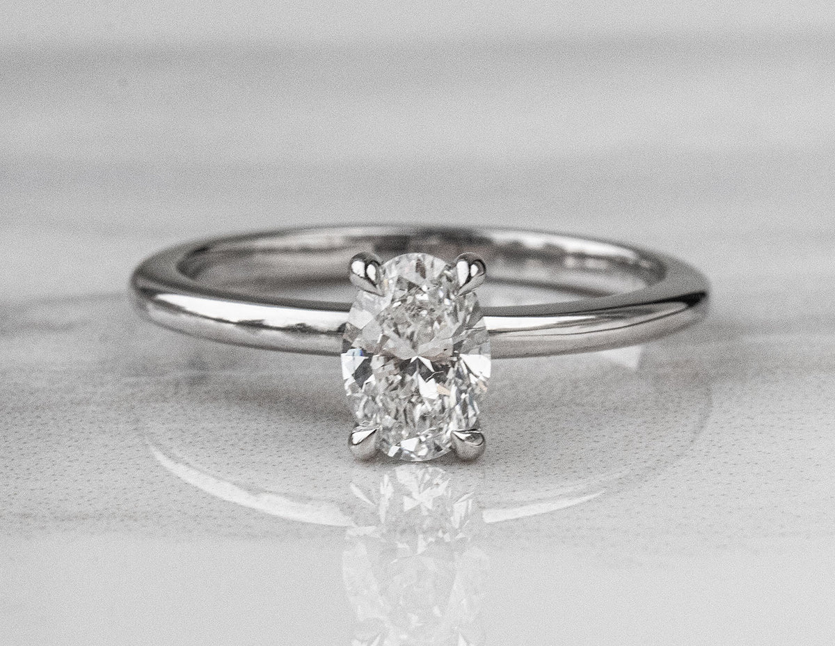 3/4ct. t.w. Oval Cut Newborn Lab Created Diamond Hidden Halo Engagement Ring in 14K White Gold