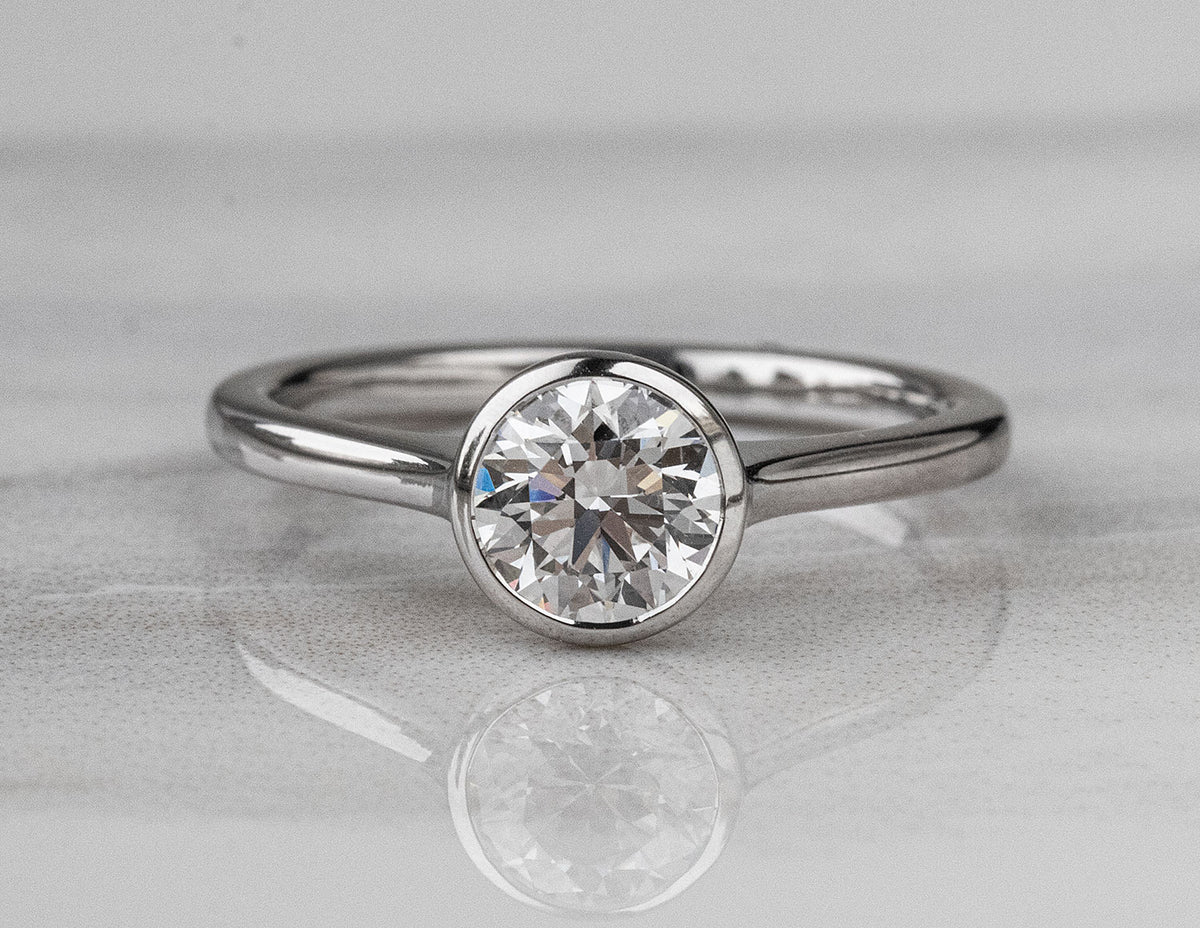 3/4ct. Round Cut Newborn Lab Created Diamond Bezel Engagement Ring in 14K White Gold