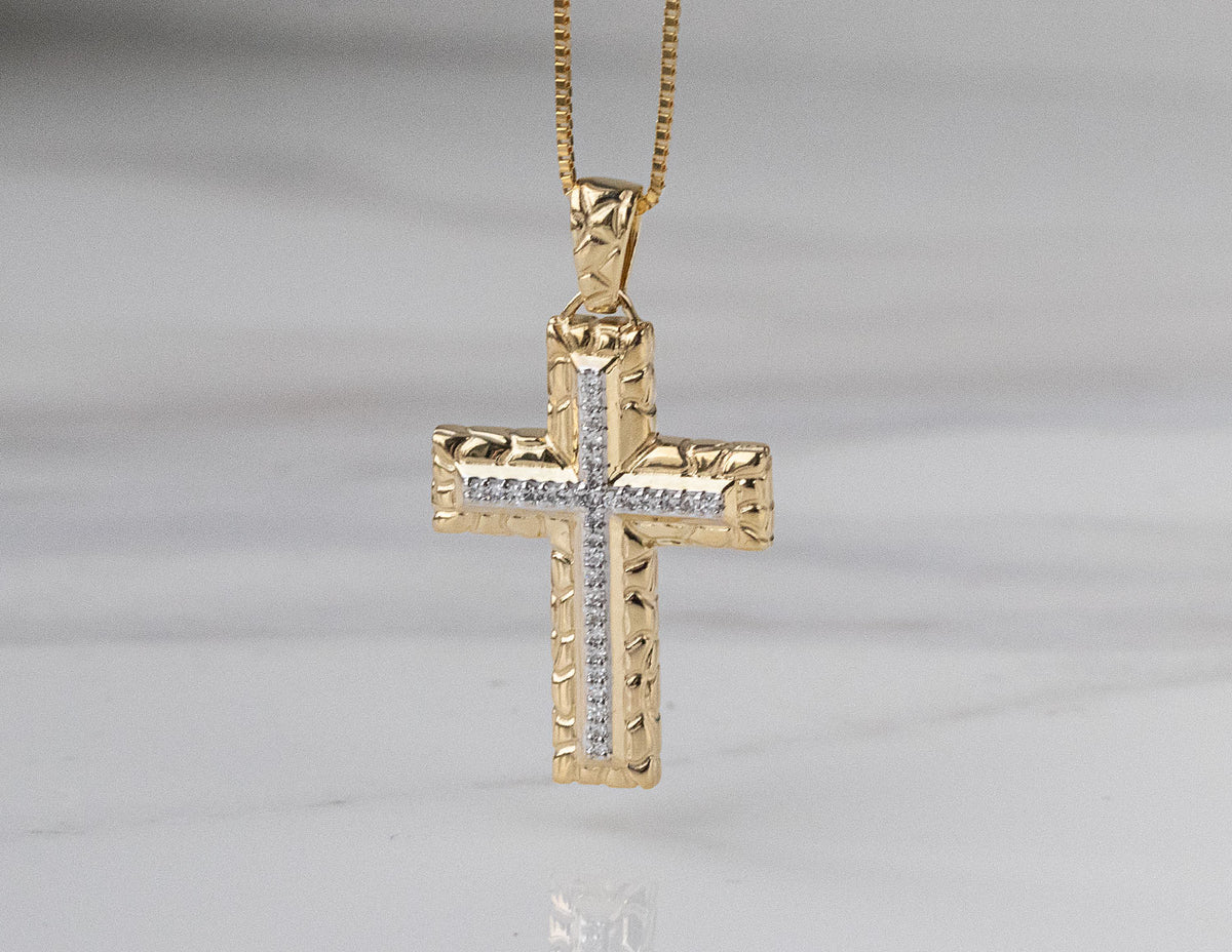 1/10ct. t.w. Diamond Cross Pendant in 10K Yellow Gold