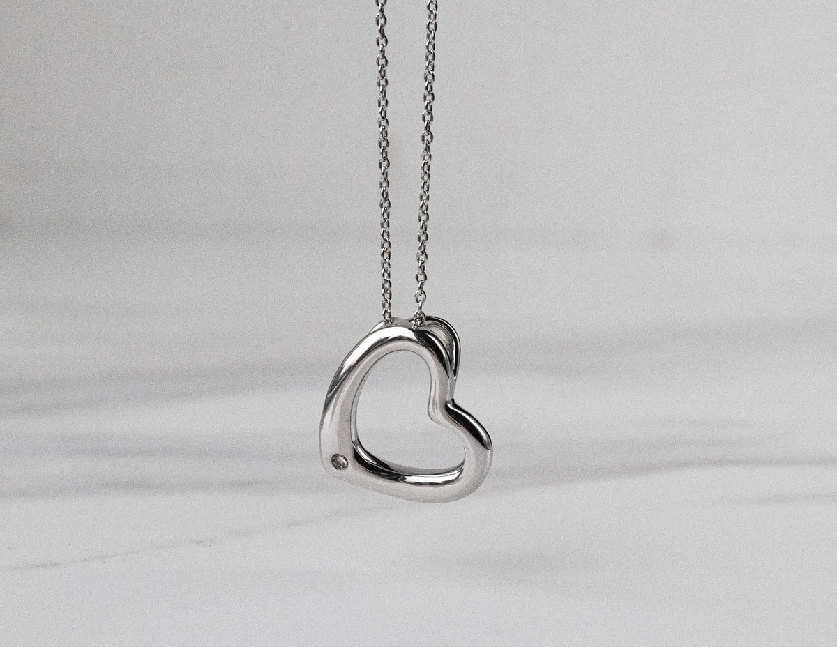 .01ct. Diamond Heart Pendant in Sterling Silver