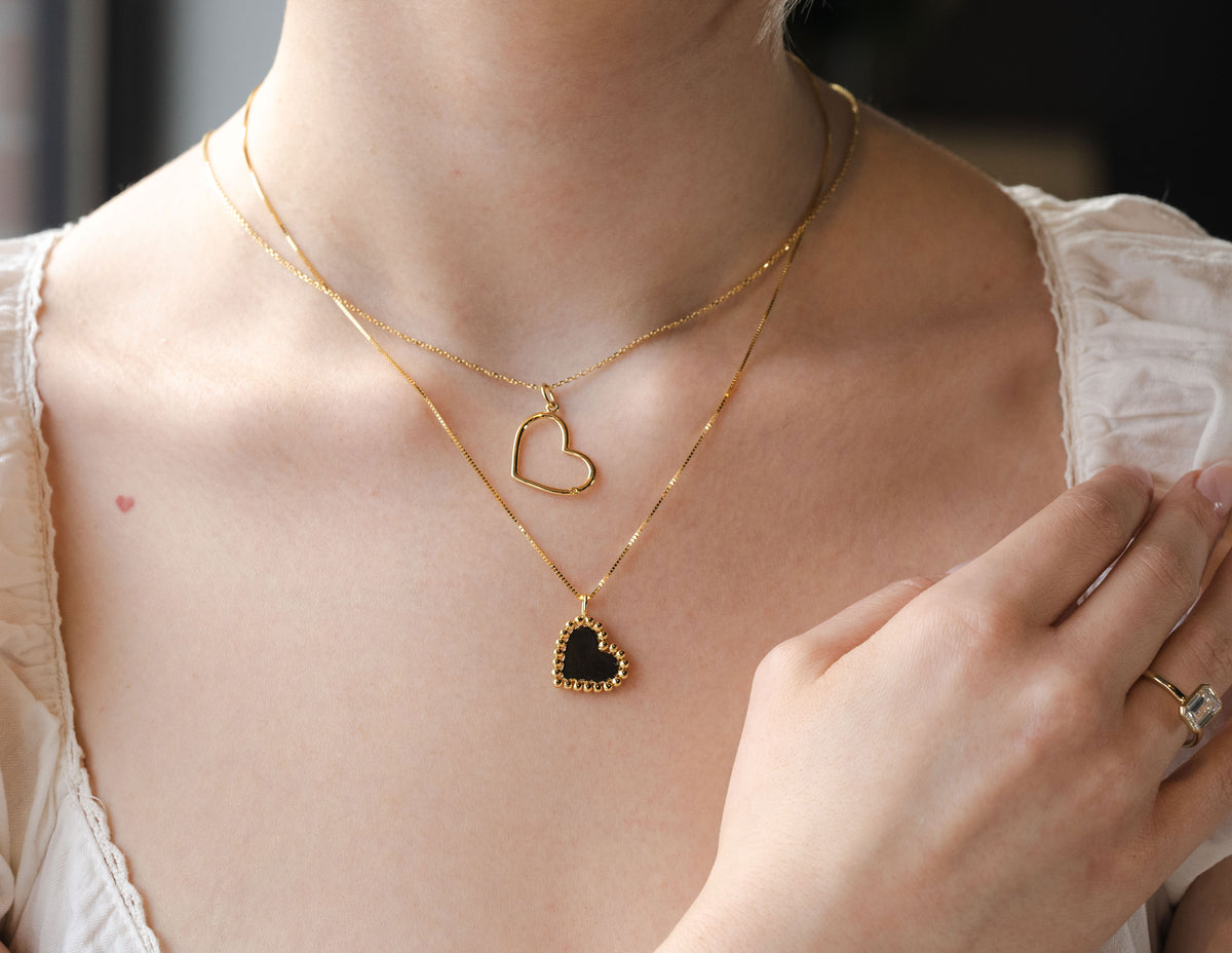 .01ct. Diamond Open Heart Pendant in 14K Yellow Gold