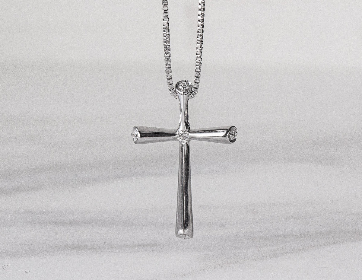 .05ct. t.w. Cross Diamond Pendant in Sterling Silver