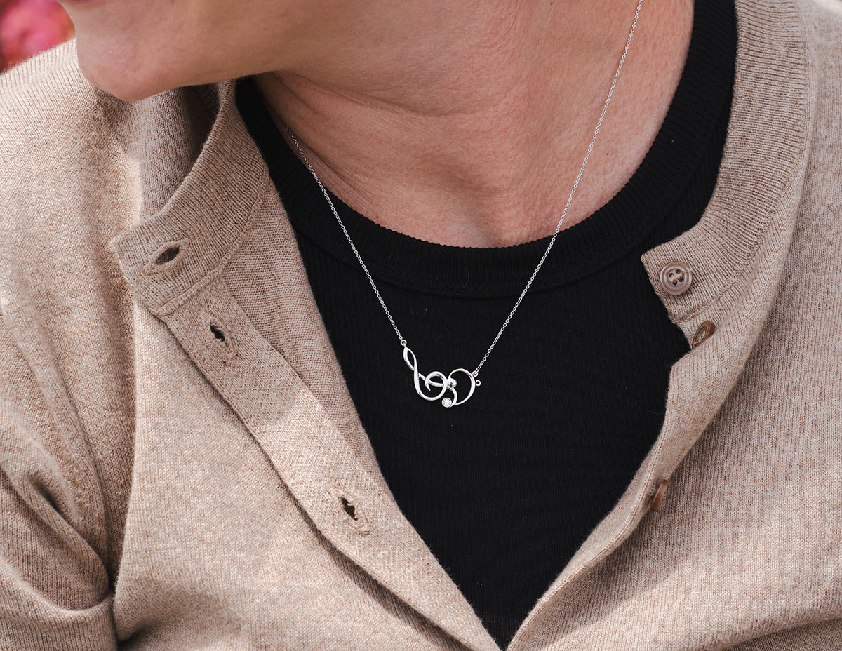 .04ct. Newborn Lab Created Diamond Musical Note Pendant in Sterling Silver
