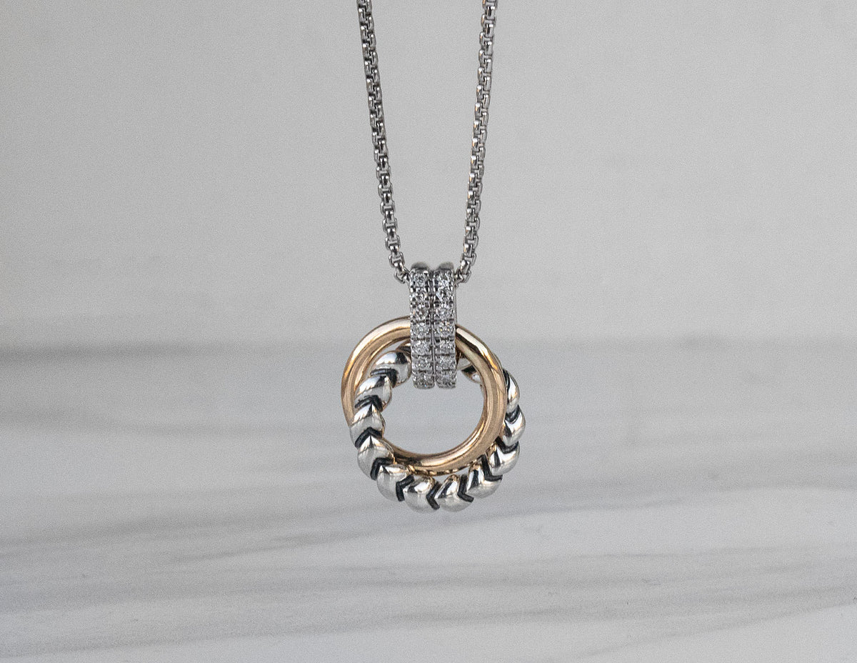 1/8ct. t.w. Antiqued Textured Diamond Pendant in 14K Yellow Gold and Sterling Silver