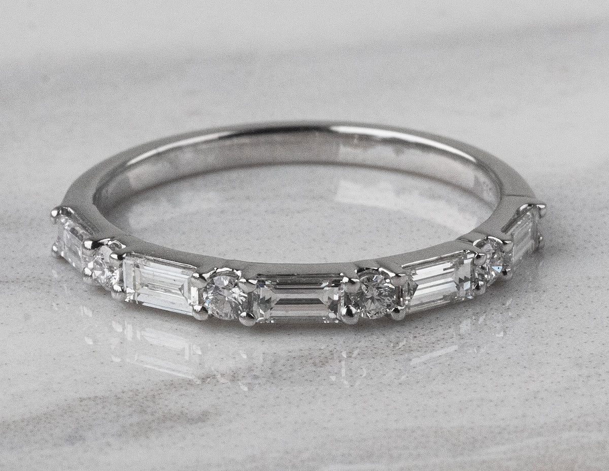 1/2ct. t.w. Baguette and Round Cut Diamond Anniversary Ring in 14K White Gold