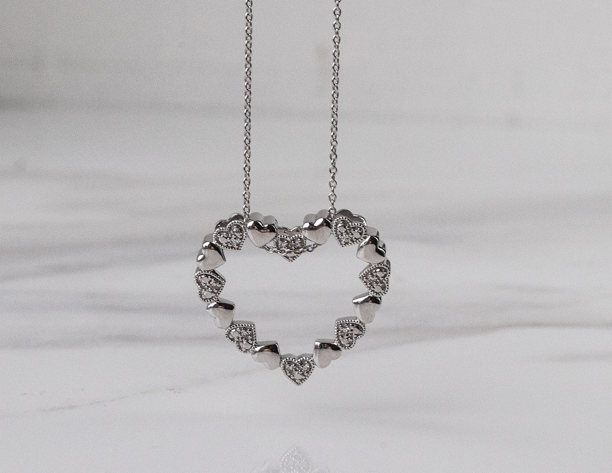 .05ct. t.w. Diamond Heart Pendant in Sterling Silver