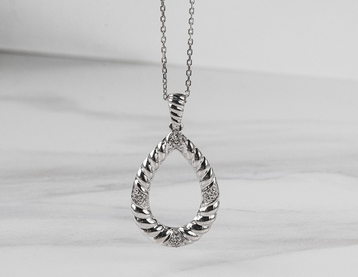 .05ct. t.w. Diamond Teardrop Pendant in Sterling Silver