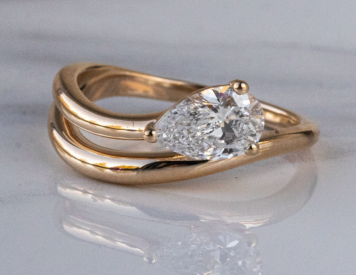 1ct. Pear Cut Newborn Lab Created Diamond Solitaire Engagement Ring in 14K Yellow Gold