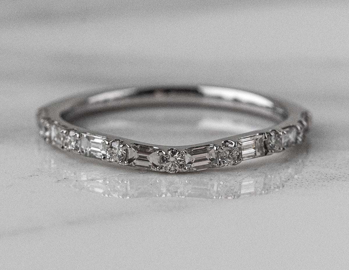 1/2ct. t.w. Round and Baguette Chevron Anniversary Ring in 14K White Gold