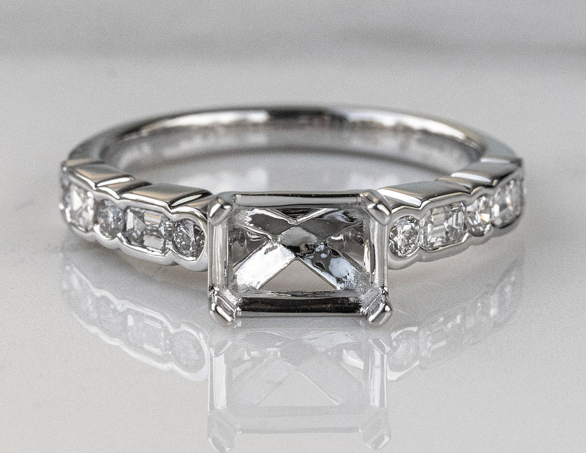 1/2ct. t.w. Emerald and Round Cut Diamond Engagement Ring in 14K White Gold