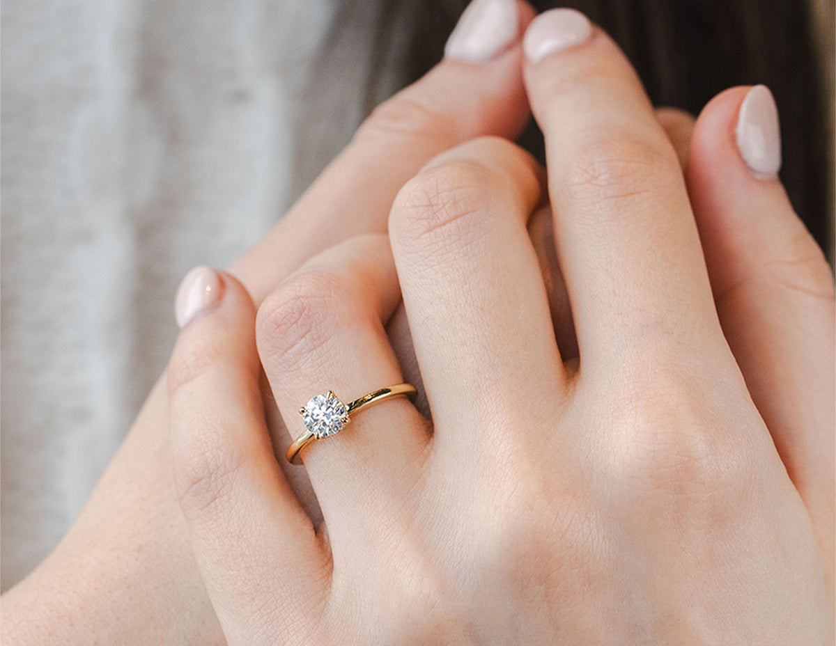 3/4ct. t.w. Round Cut Newborn Lab Created Diamond Hidden Halo Engagement Ring in 14K Yellow Gold