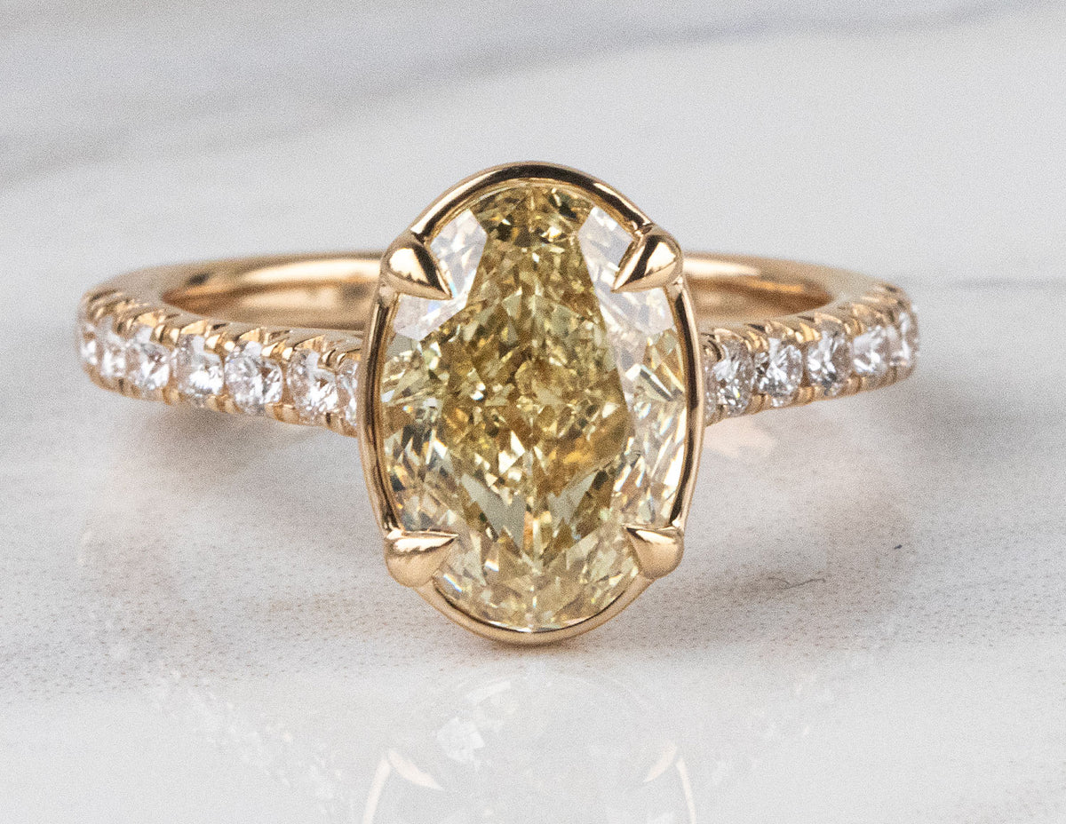 3 1/3ct. t.w. Yellow Oval Cut Newborn Lab Created Diamond Engagement Ring in 14K Yellow Gold