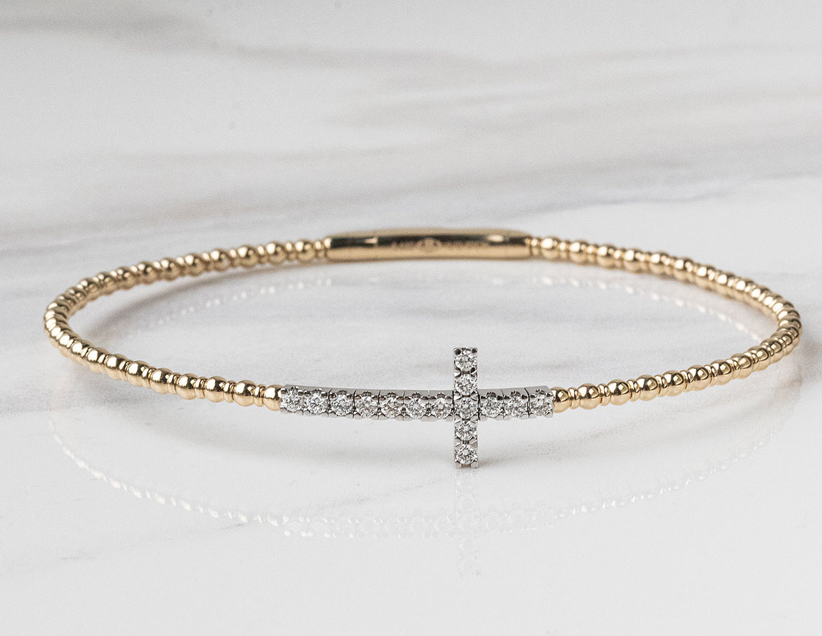 1/3ct. t.w. Diamond Cross Bracelet in 14K Yellow and White Gold