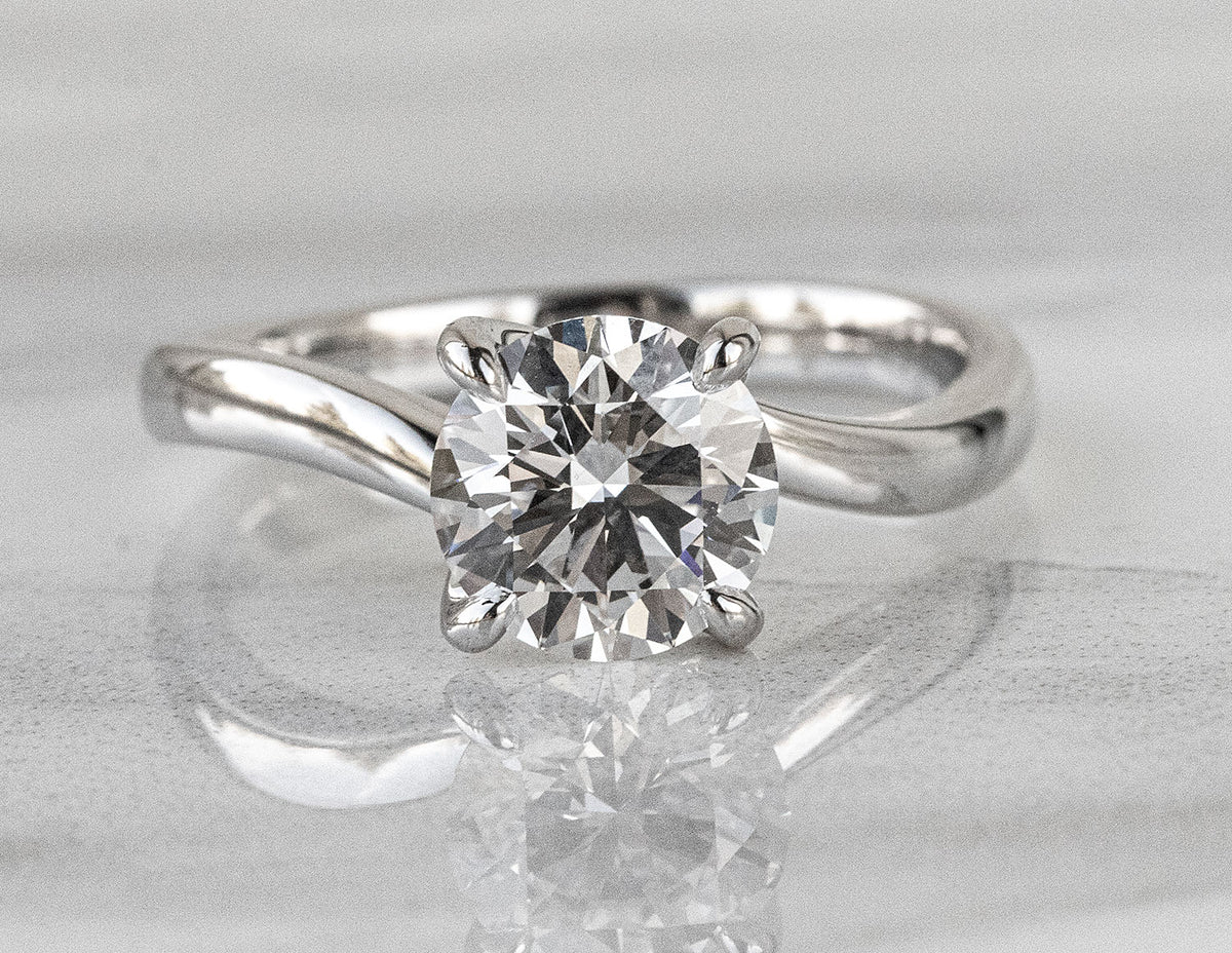 1 1/2ct. Round Cut Newborn Lab Created Diamond Twist Solitaire Engagement Ring in 14K White Gold