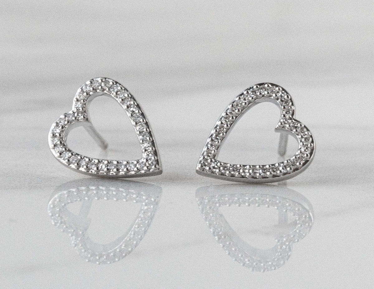 1/5ct. t.w. Diamond Heart Earrings in Sterling Silver