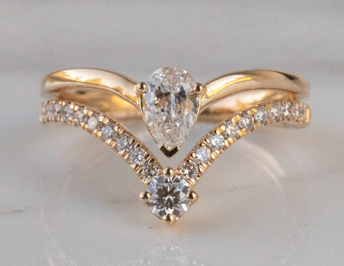 7/8ct. t.w. Pear and Round Newborn Lab Created Diamond Fashion Ring in 14K Yellow Gold