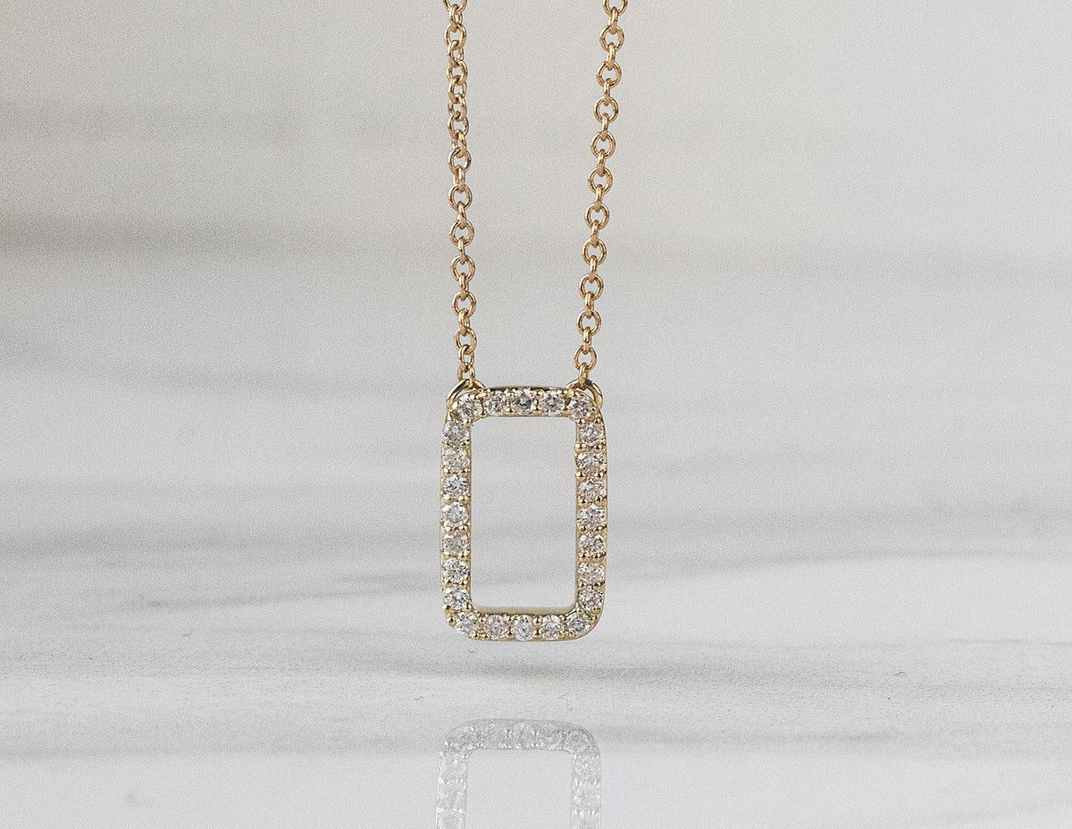 1/10ct. t.w. Diamond Rectangle Pendant in 10K Yellow Gold
