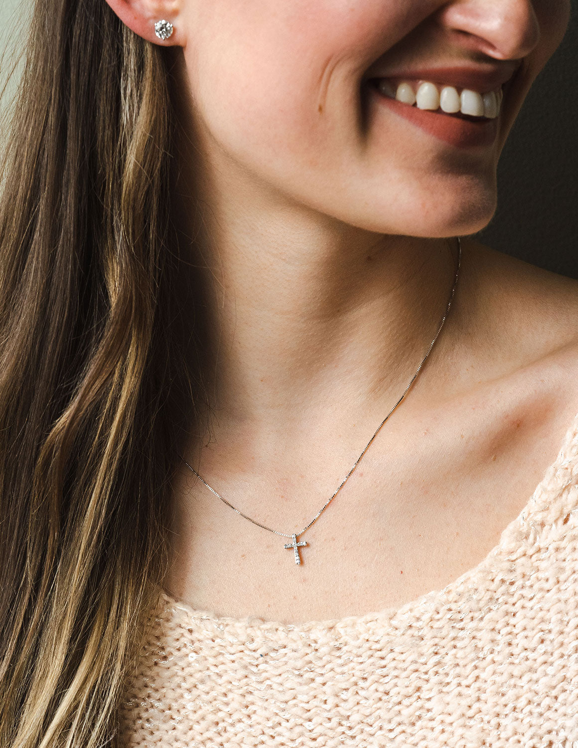 1/10ct. t.w. Diamond Cross Pendant in Sterling Silver