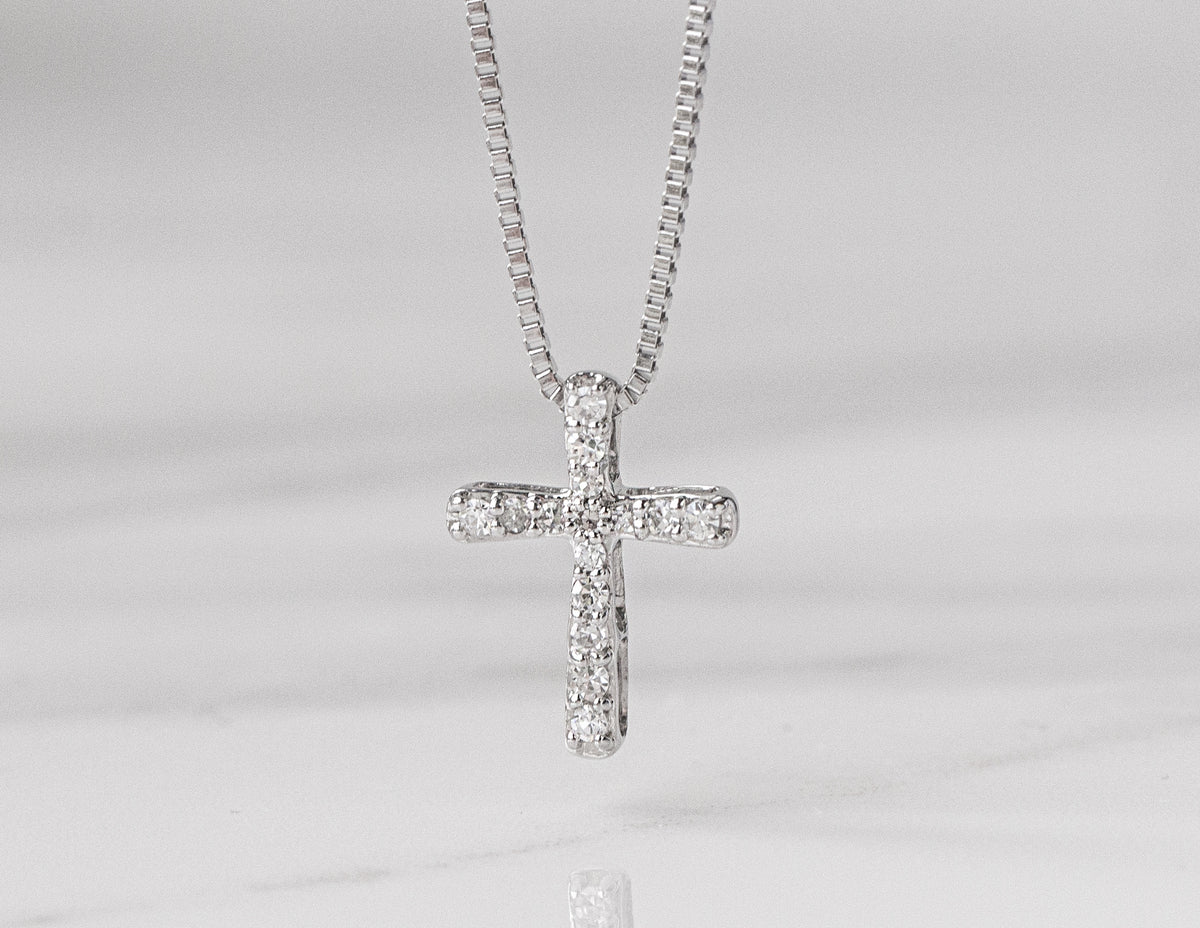 1/10ct. t.w. Diamond Cross Pendant in Sterling Silver