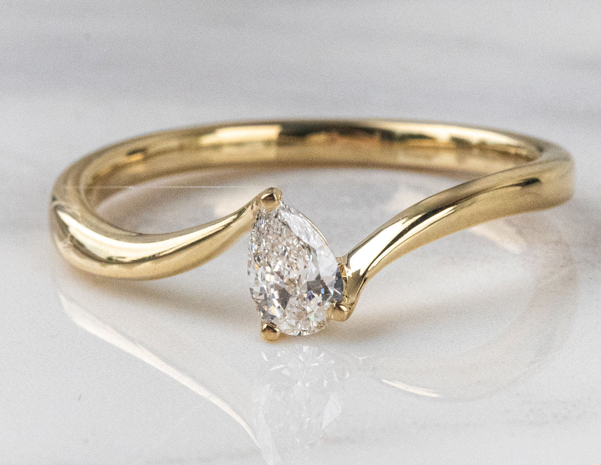 1/4ct. Pear Cut Newborn Lab Created Diamond in 10K Yellow Gold