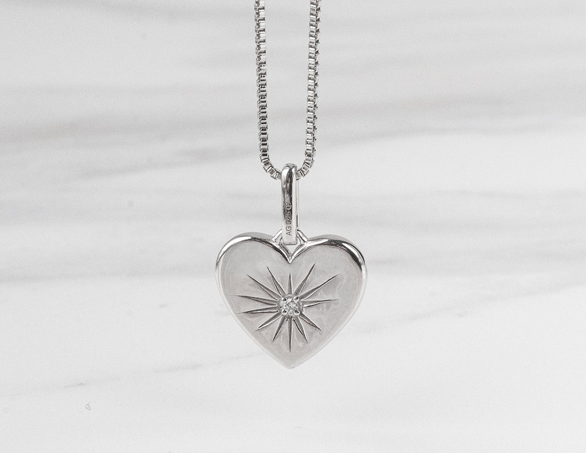 .01ct. Diamond Heart Pendant in Sterling Silver