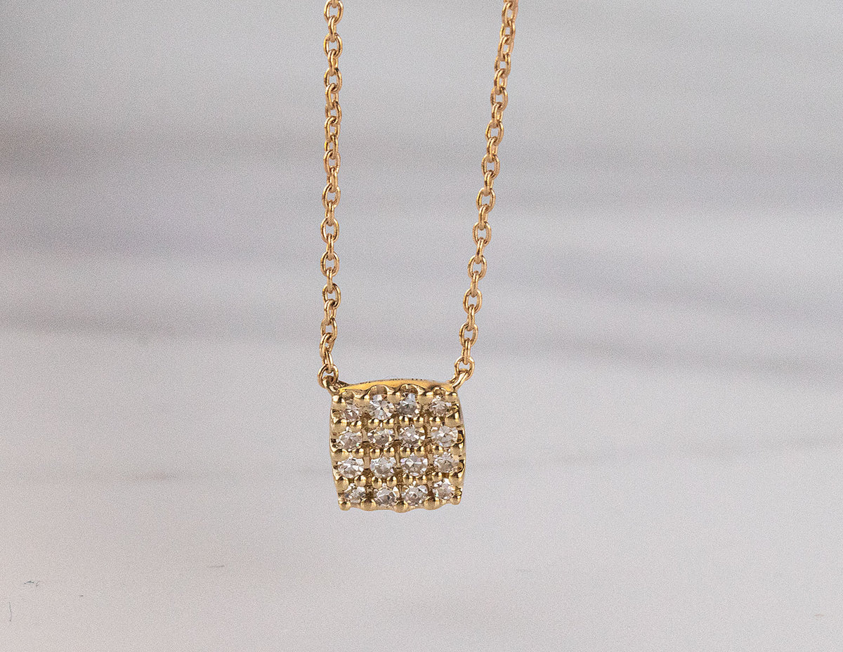 1/8ct. t.w. Diamond Cushion Pendant in 10K Yellow Gold