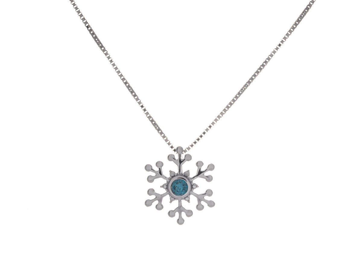 1/10ct. Diamond Snowflake Pendant in Sterling Silver