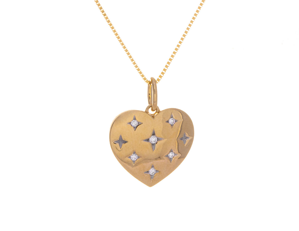 .05ct. t.w. Diamond Heart Pendant in 10K Yellow Gold