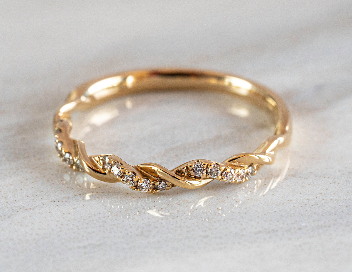 1/10ct. t.w. Diamond Braided Ring in 14K Yellow Gold