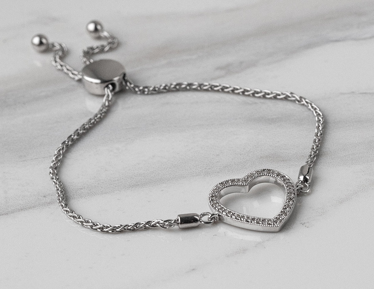 1/14ct. t.w. Heart Bolo Diamond Bracelet in Sterling Silver