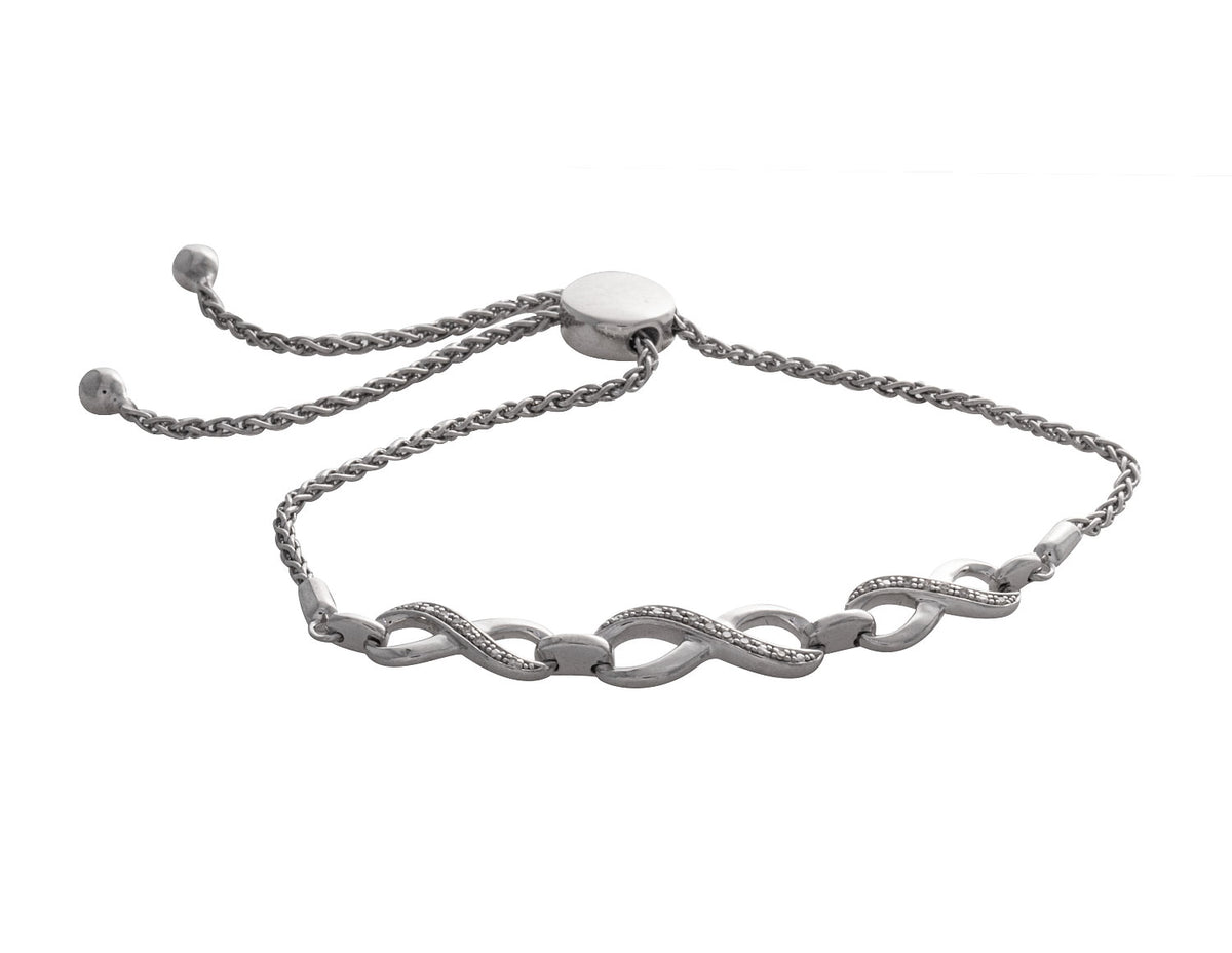 1/14ct. t.w. Diamond Infinity Bracelet in Sterling Silver
1/14ct. t.w. Infinity Bracelet in Sterling Silver