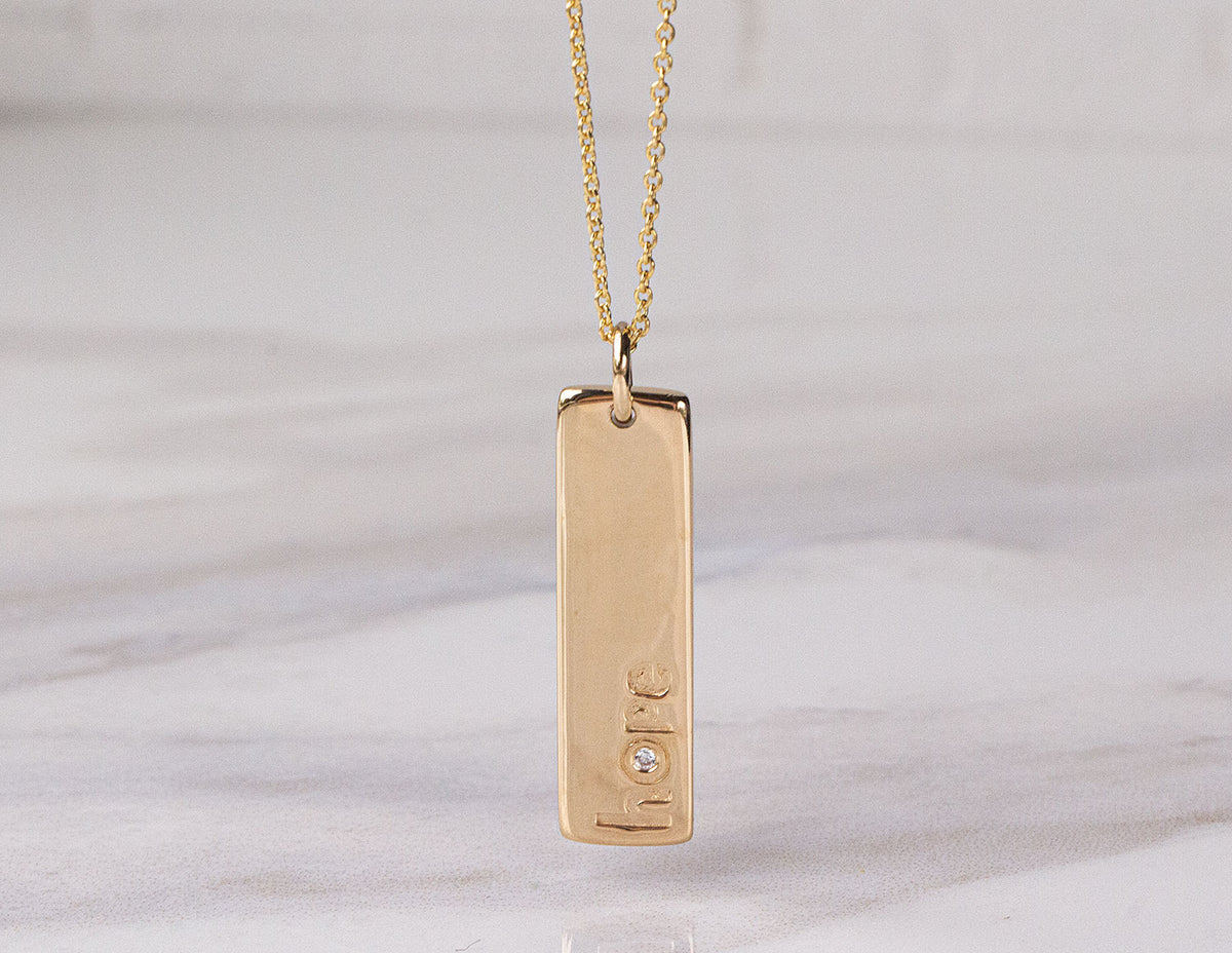 .004ct. Diamond Bar Pendant in 14K Yellow Gold