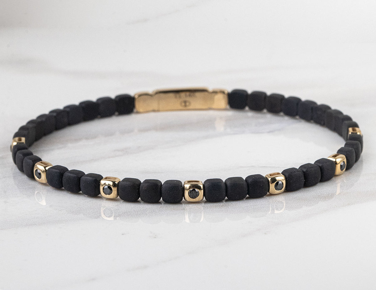 1/4ct. t.w. Black Diamond Bangle Bracelet in Titanium and 14K Yellow Gold