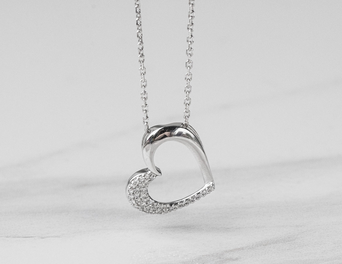 1/10ct. t.w. Diamond Heart Pendant in Sterling Silver