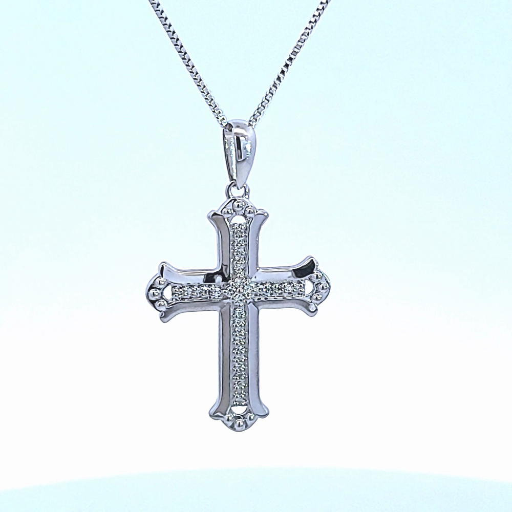 1/10ct. t.w. Diamond Cross Pendant in Sterling Silver