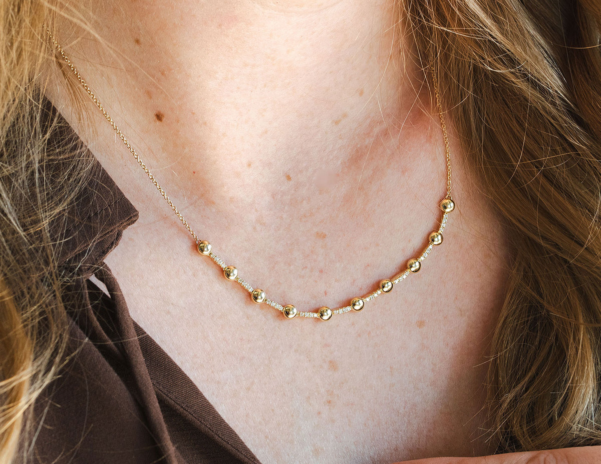 1/5ct. t.w. Diamond Disc Station Necklace in 14K Yellow Gold
