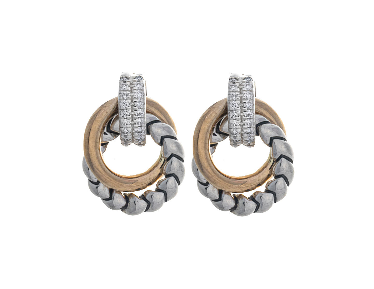 1/8ct. t.w. Diamond Earrings in 14K Yellow and Sterling Silver