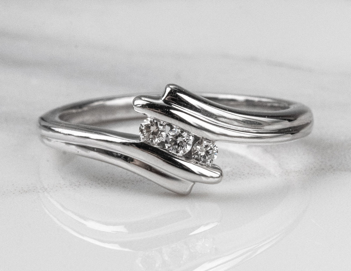 1/10ct. t.w. 3-Stone Diamond Promise Ring in Sterling Silver