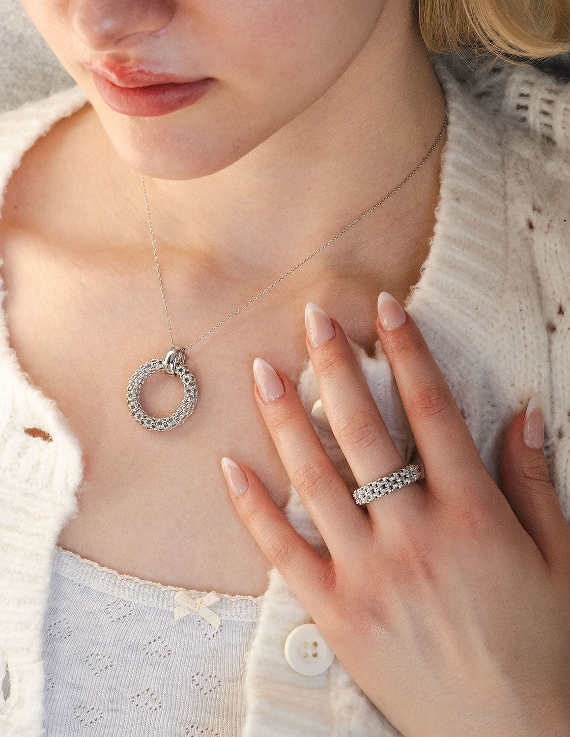 1/8ct. t.w. Diamond Circle Pendant in Sterling Silver