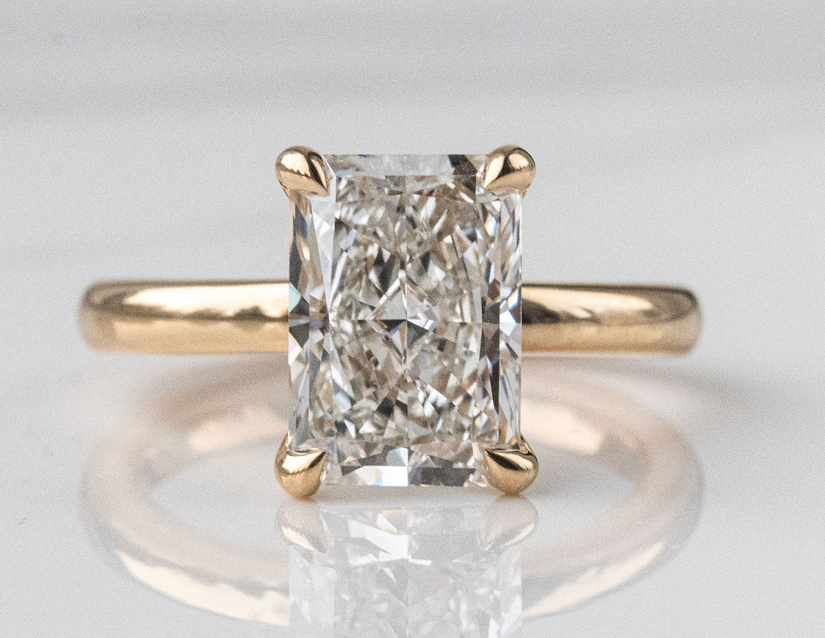 4ct. Radiant Cut Newborn Lab Created Diamond Solitaire Engagement Ring in 14K Yellow Gold
