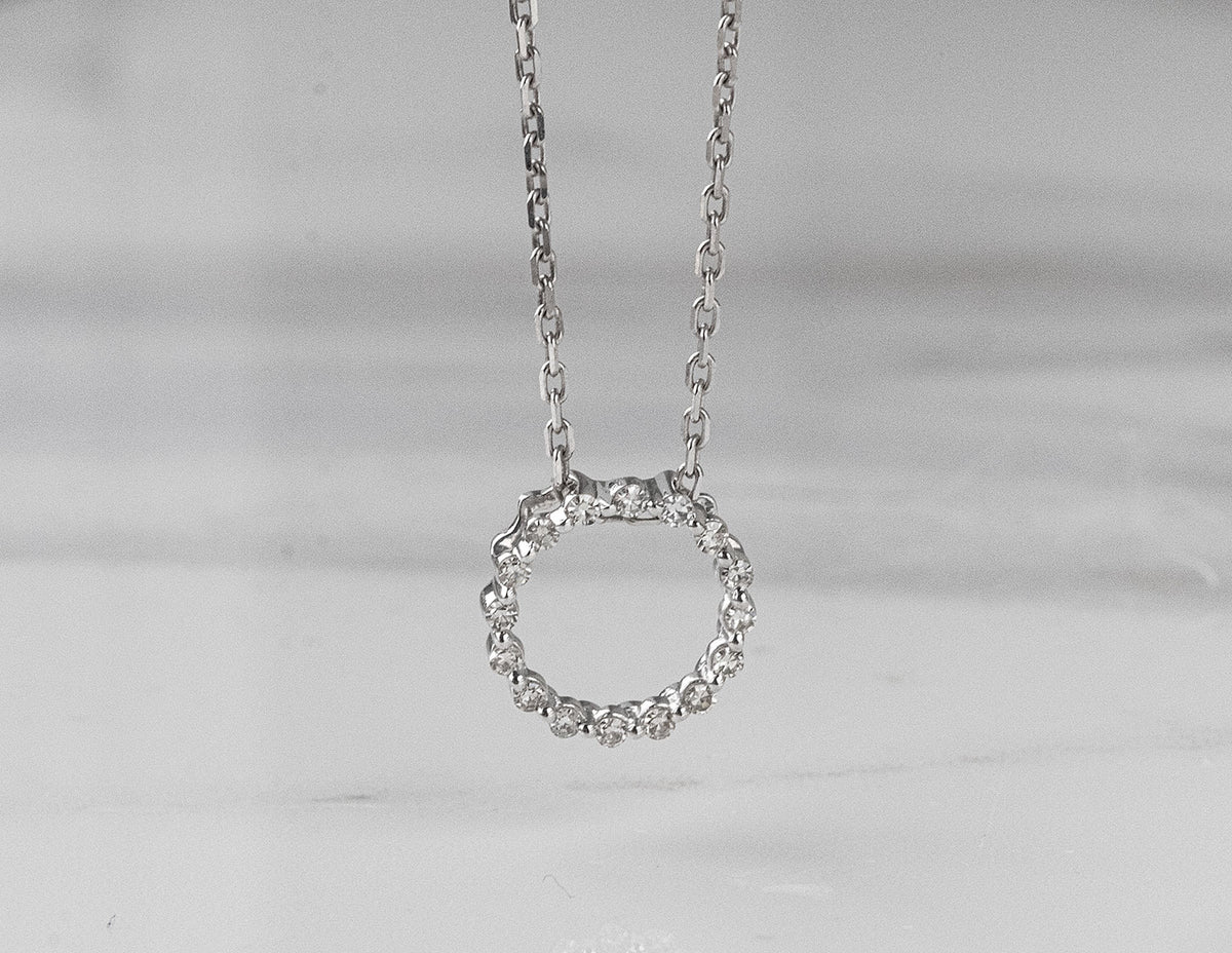 1/10ct. t.w. Diamond Circle Pendant in Sterling Silver