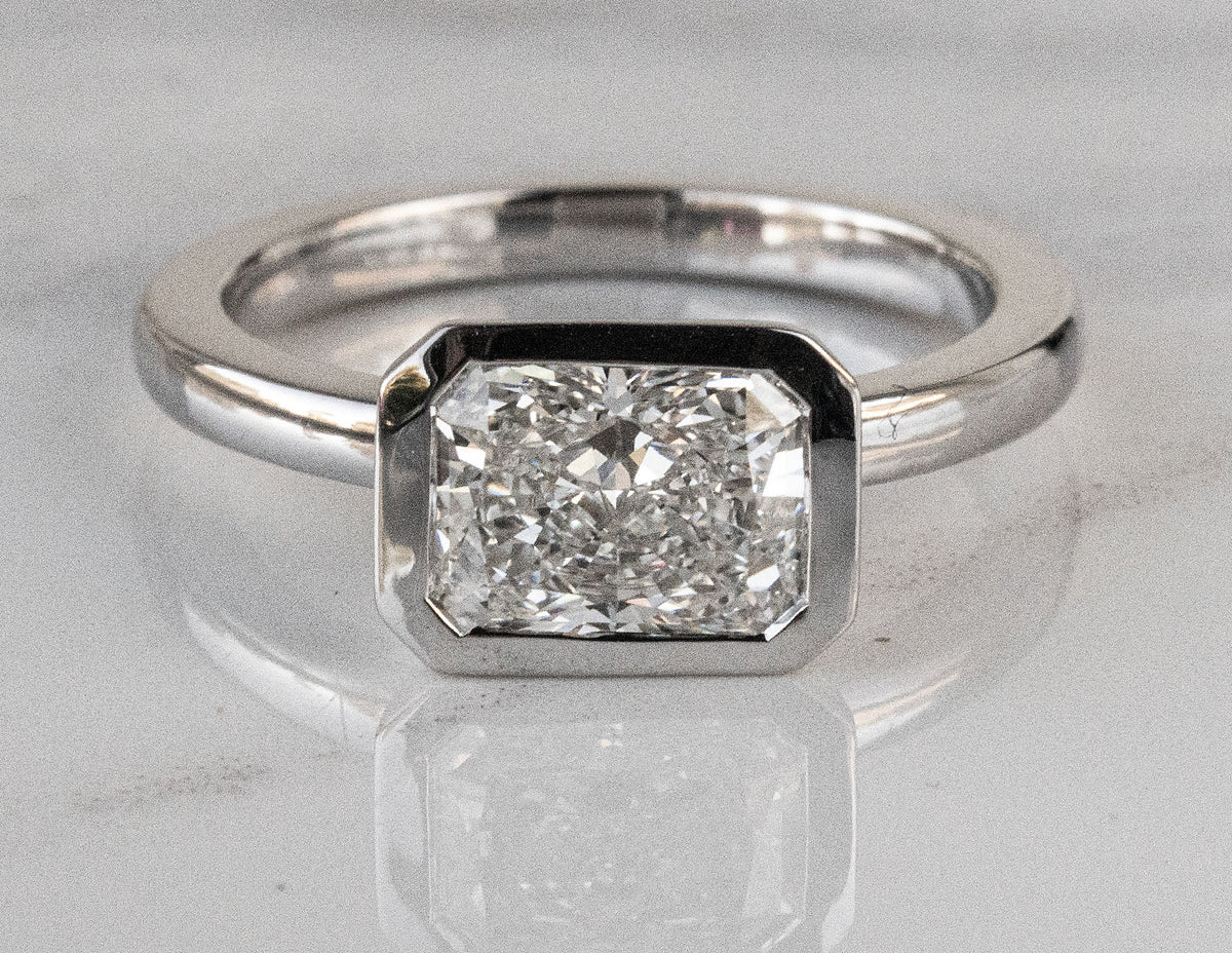 2ct. Radiant Cut Newborn Lab Created Diamond Bezel Solitaire Engagement Ring in 14K White Gold