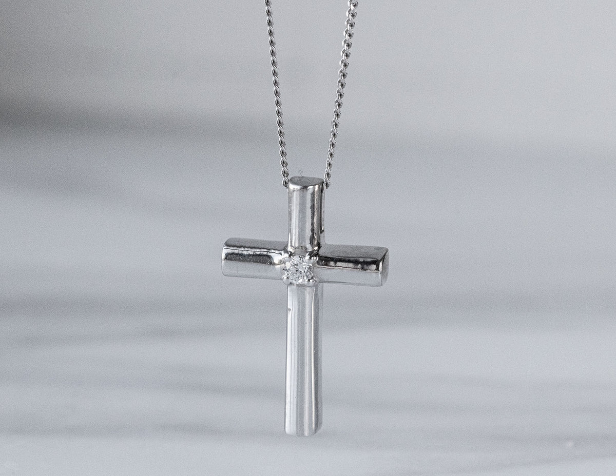 .05ct. Diamond Cross Pendant in Sterling Silver