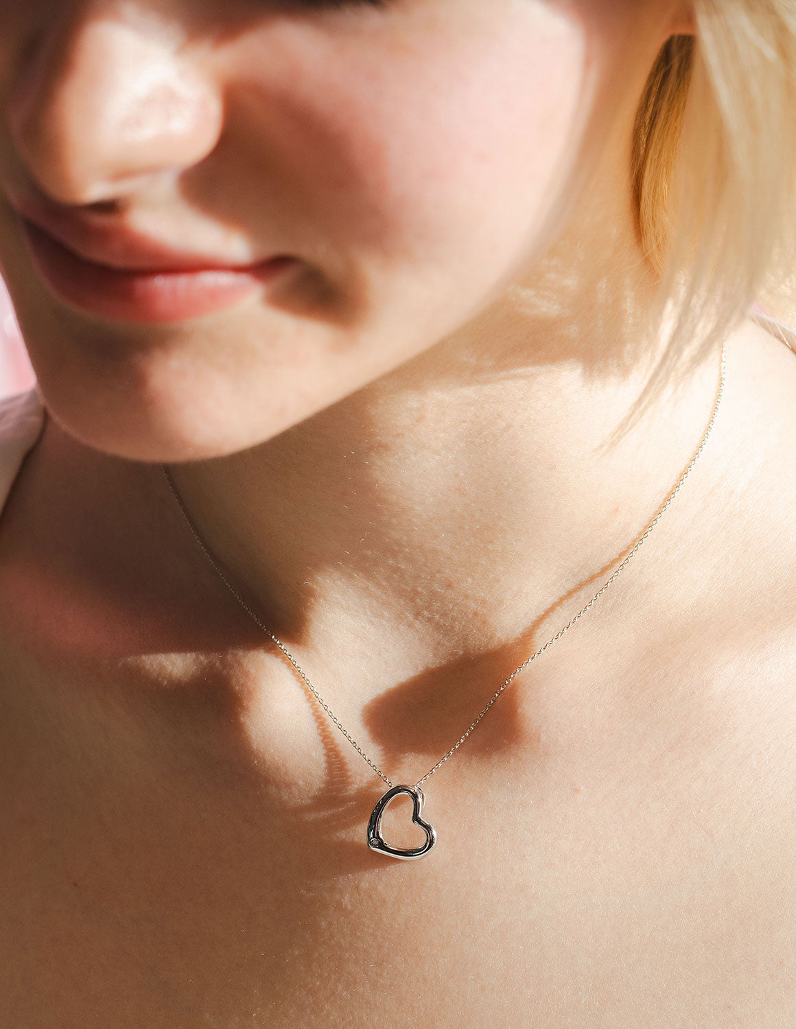 .01ct. Diamond Heart Pendant in Sterling Silver