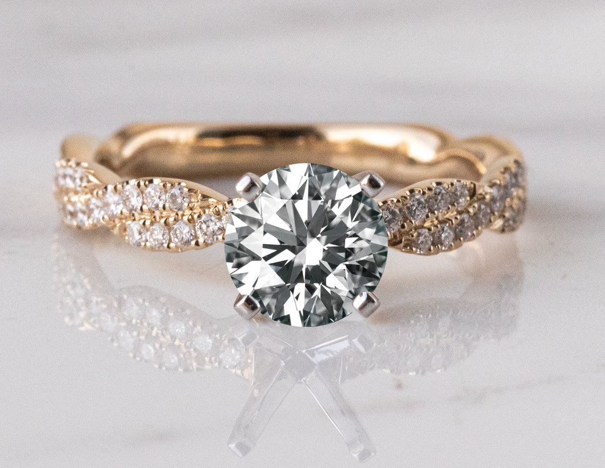 1/4ct. t.w. Diamond Engagement Ring in 14K Yellow Gold
