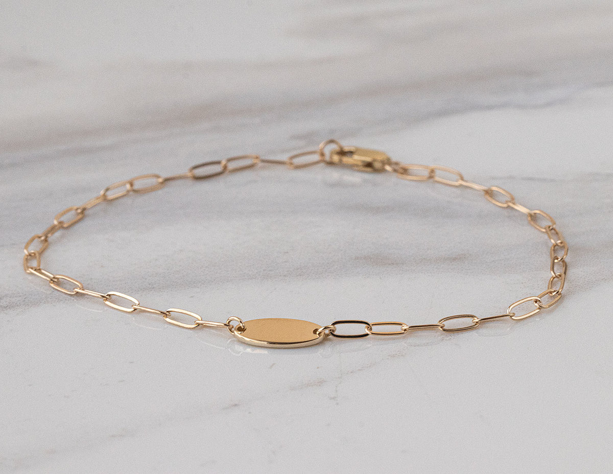 7" Engravable Oval Disc Paperclip Bracelet in 14K Yellow Gold